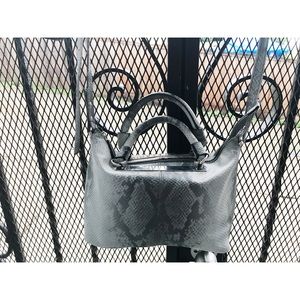 Small target purse with snake skin pattern